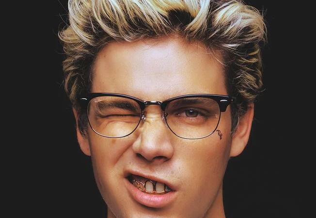 Man wearing rayban Clubmaster glasses